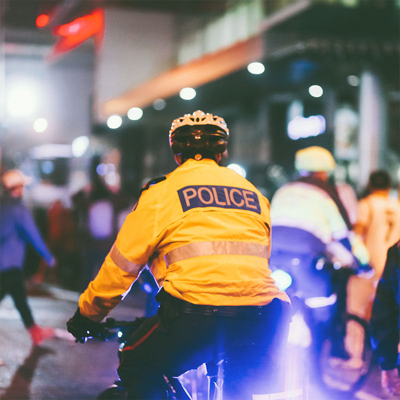 Police officer on a bicycle.