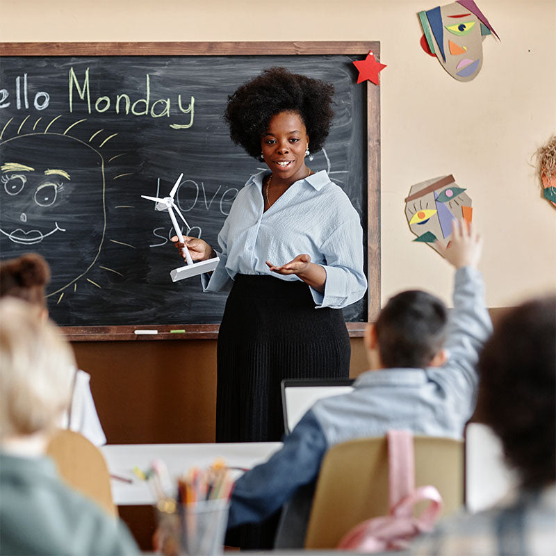 Teacher in classroom.